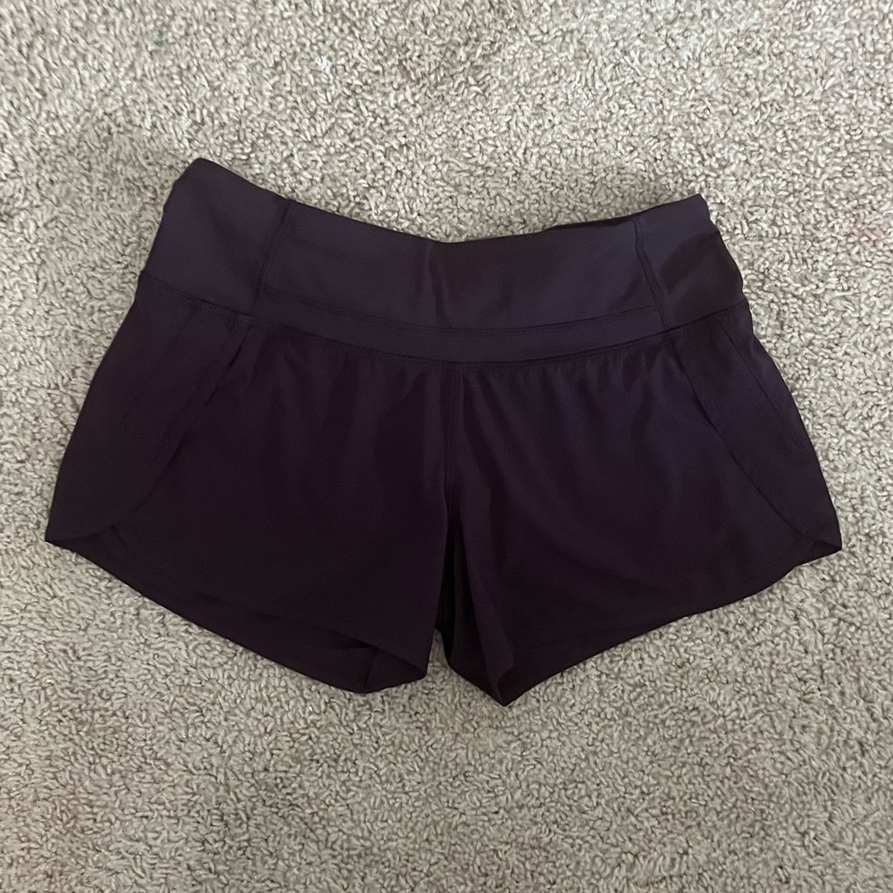 LULULEMON mid-rise speed ups 4" inseam size 4